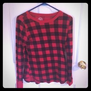 Red and black plaid thermal.